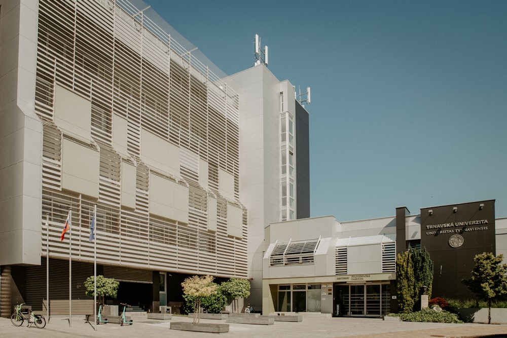 a large building with a lot of windows on the side of it