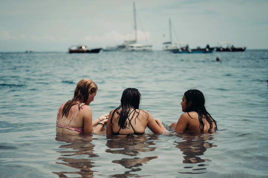 Women relaxing together in warm water