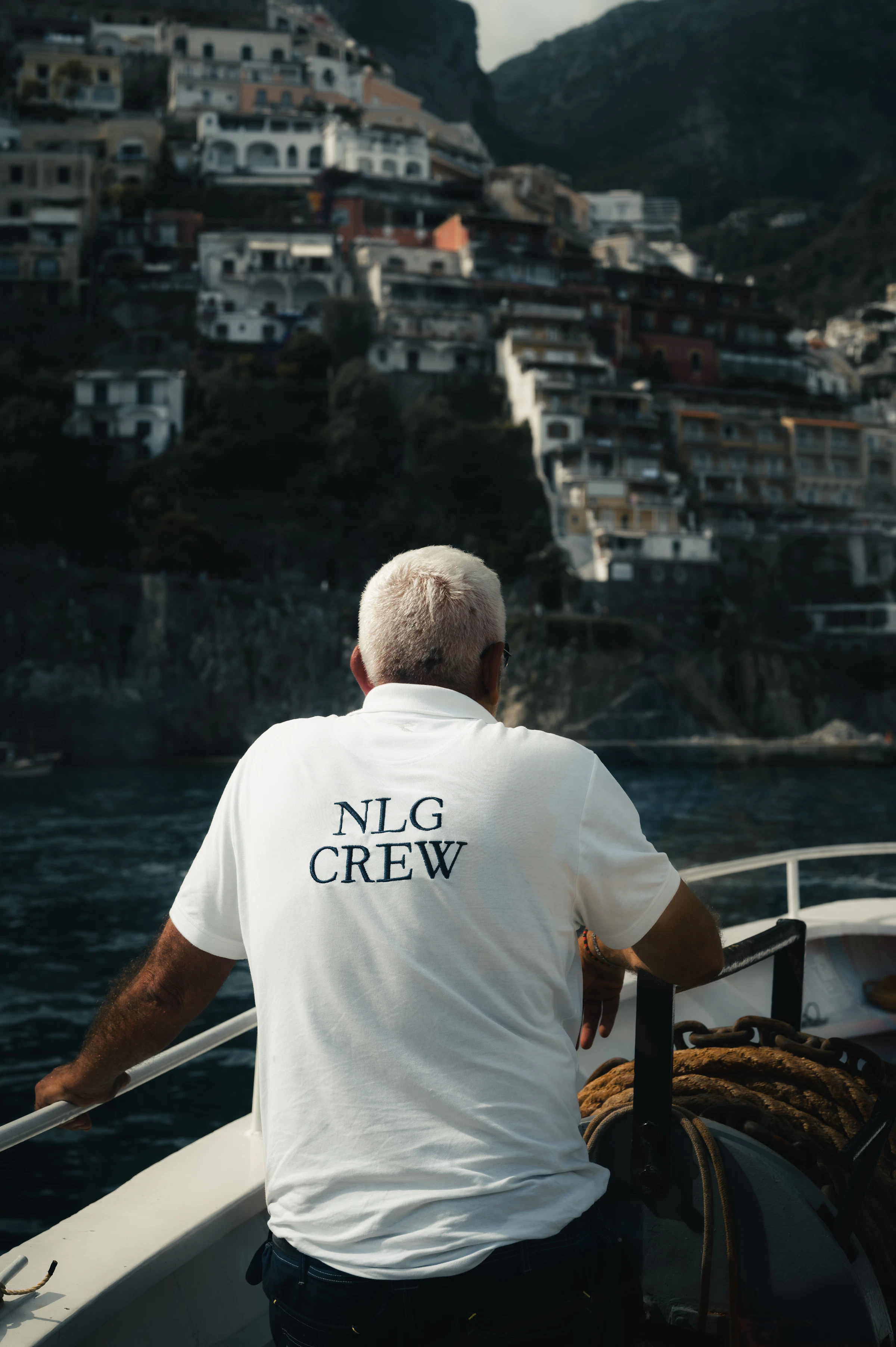 Yacht crew in uniform on deck
