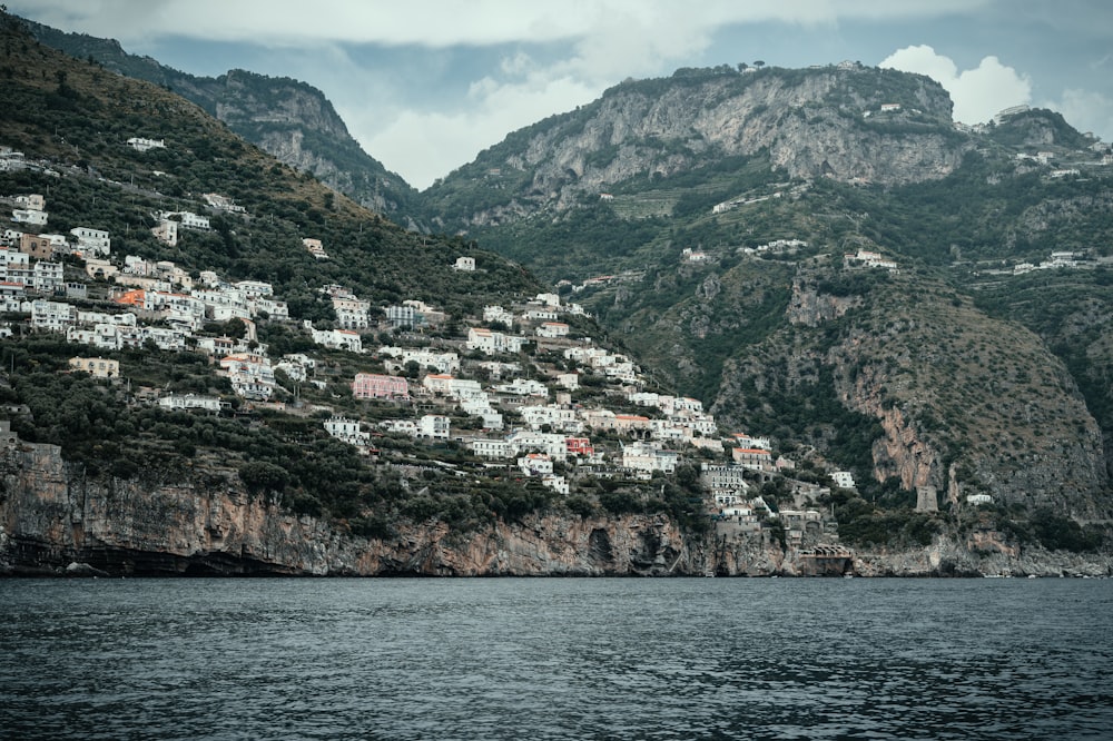 a view of a village on the side of a mountain