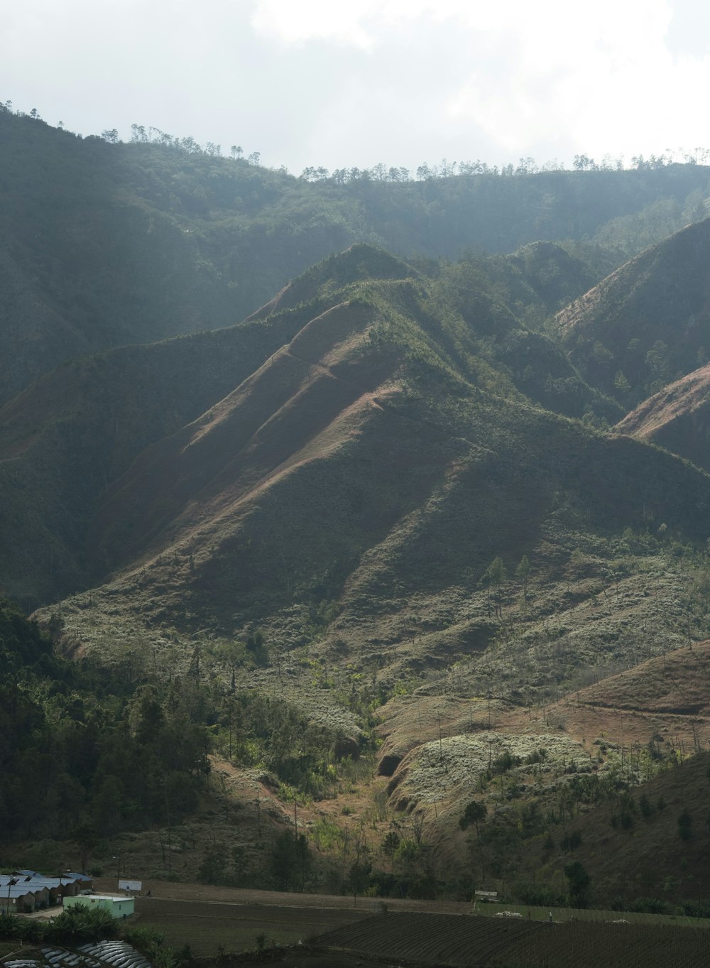 a view of a mountain range from a distance