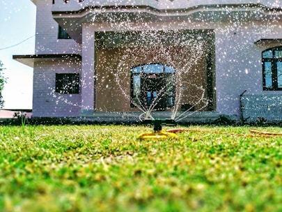 A modern irrigation system installed in a lush green garden.
