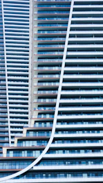 a very tall building next to a very tall building