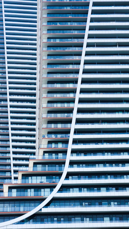 a very tall building next to a very tall building