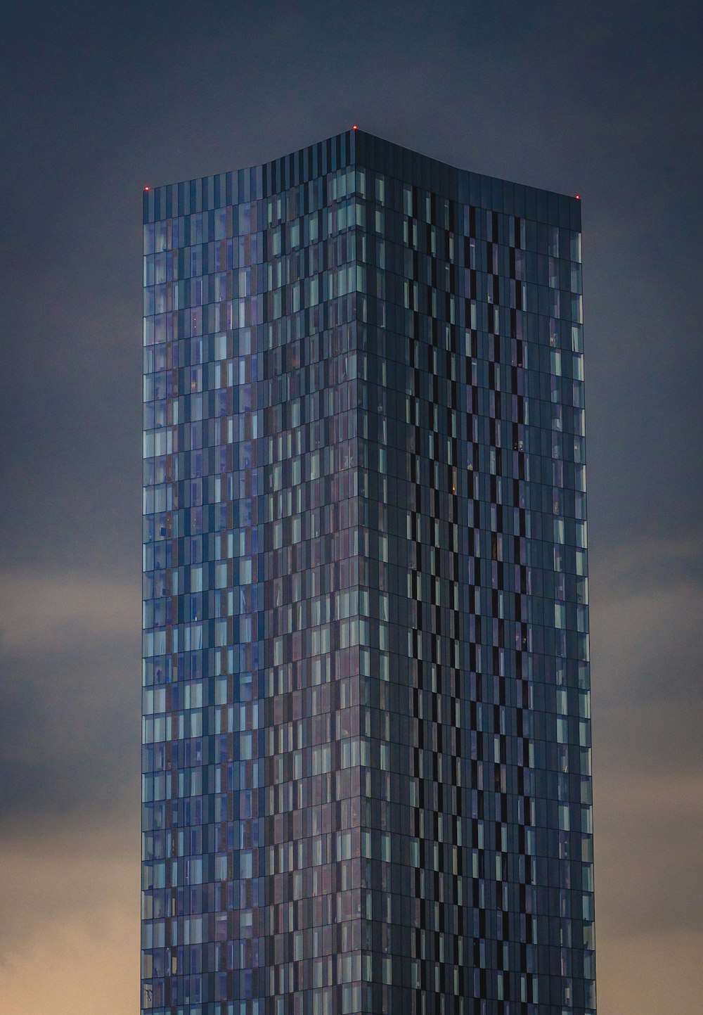 a very tall building with many windows on it