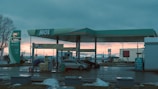 a car is parked at a gas station