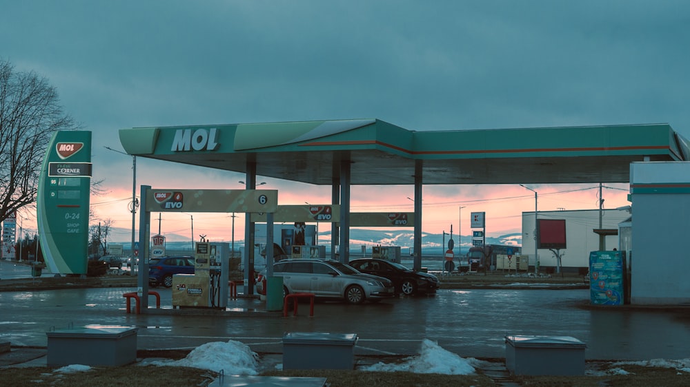 a car is parked at a gas station