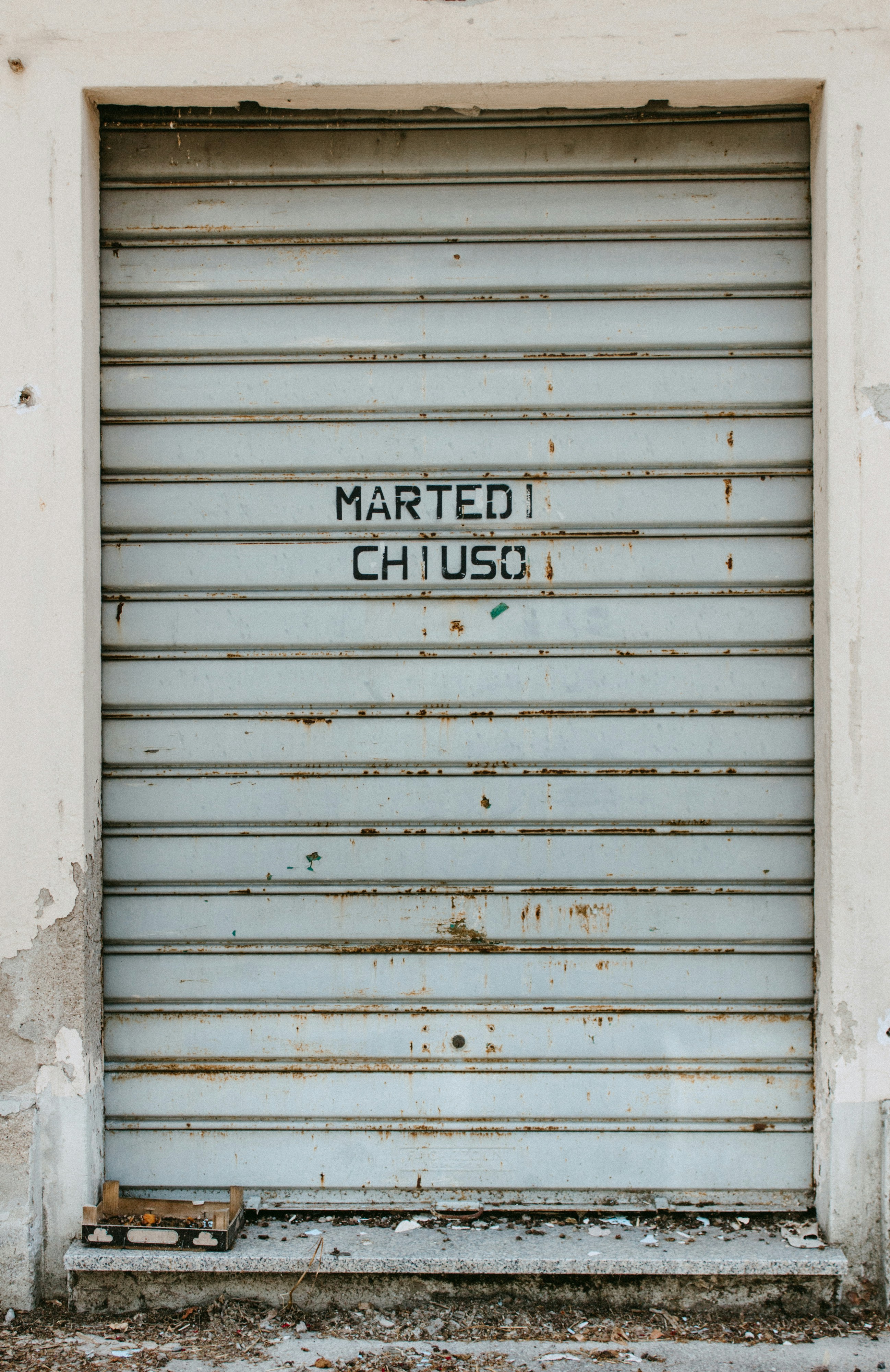 a closed garage door with the word married chuus written on it