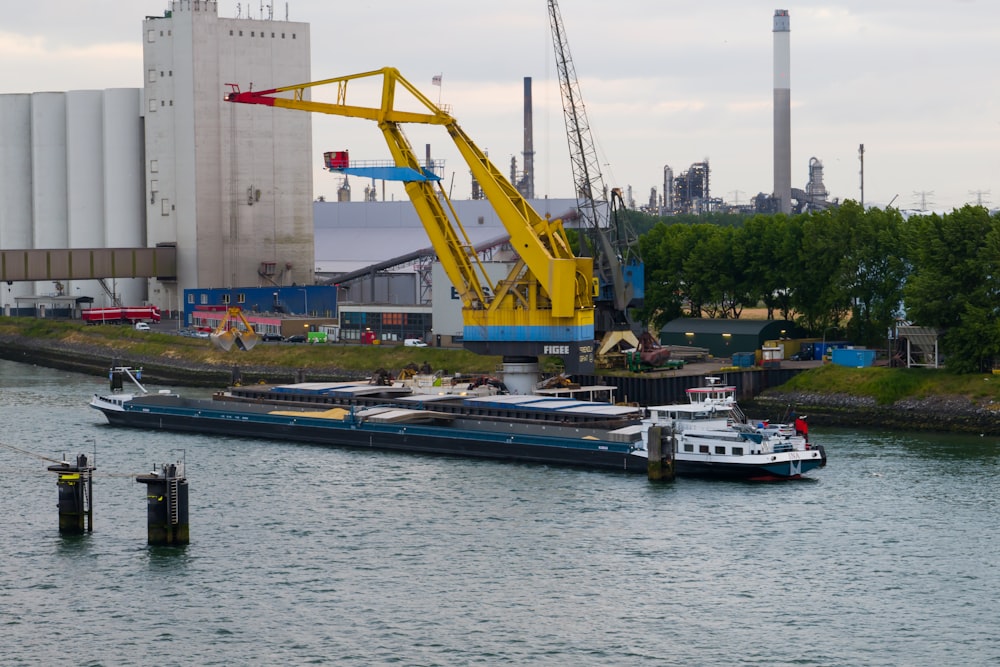 a crane is on a barge in the water