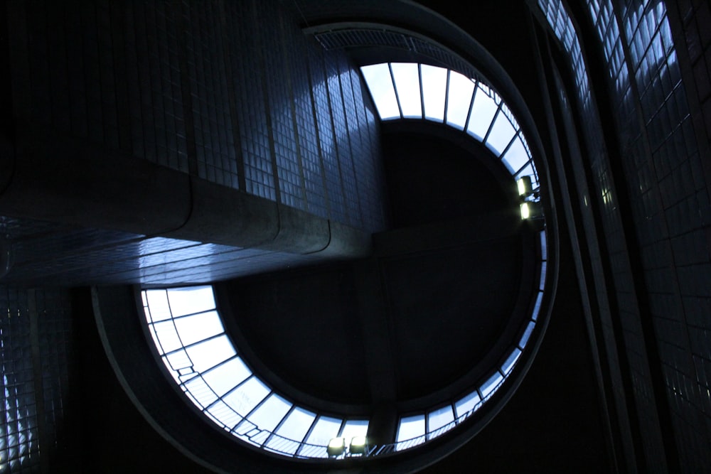 a circular window in a building with a skylight