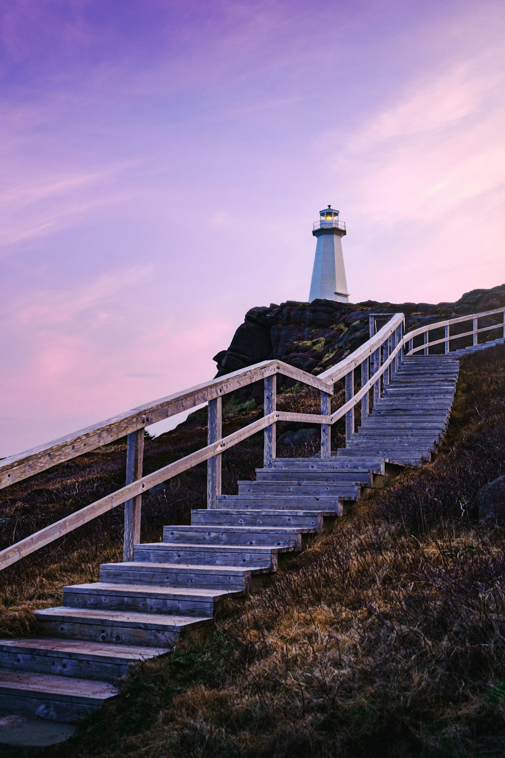 a set of stairs leading to a lighthouse