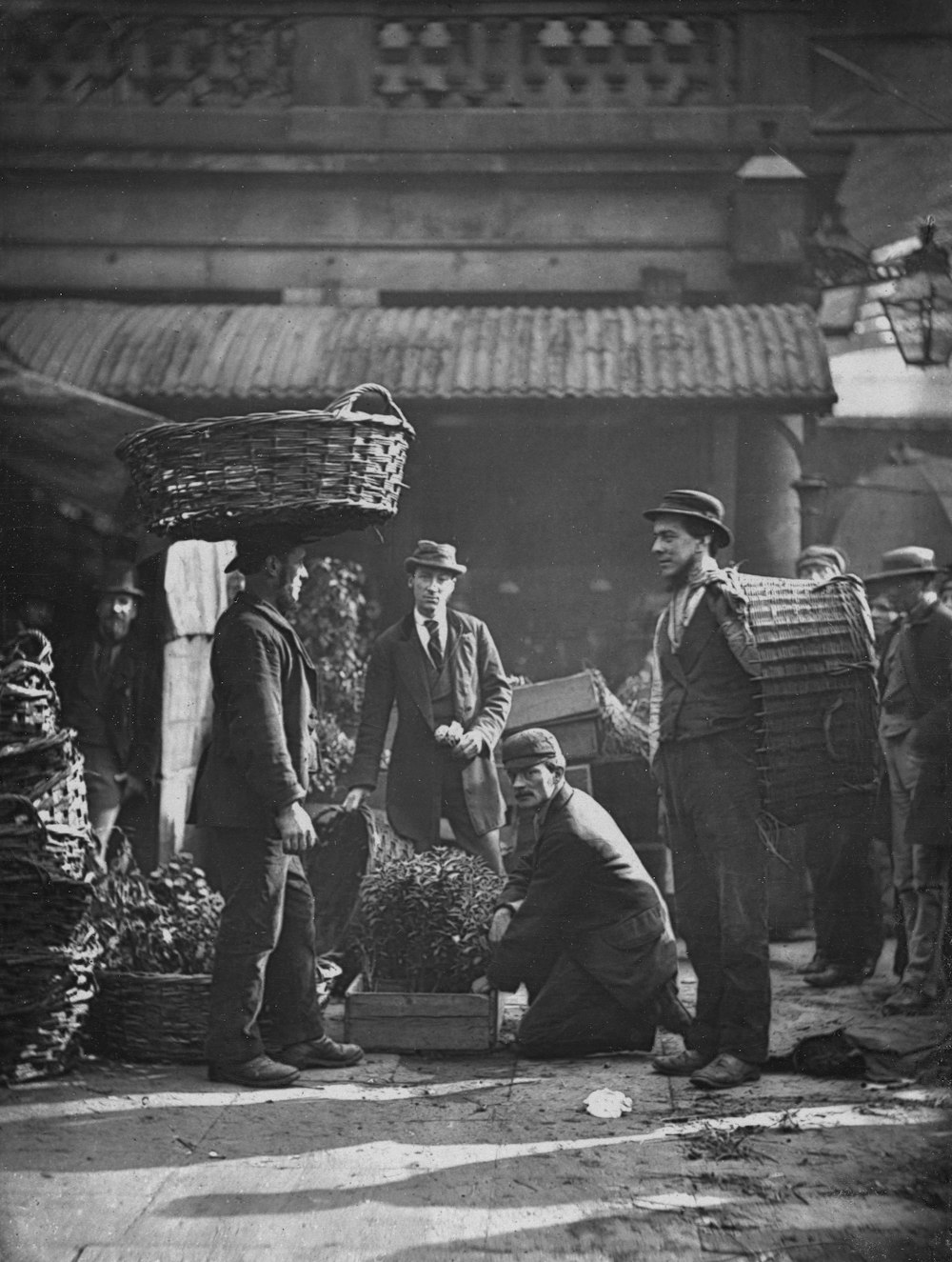 a group of men standing next to each other