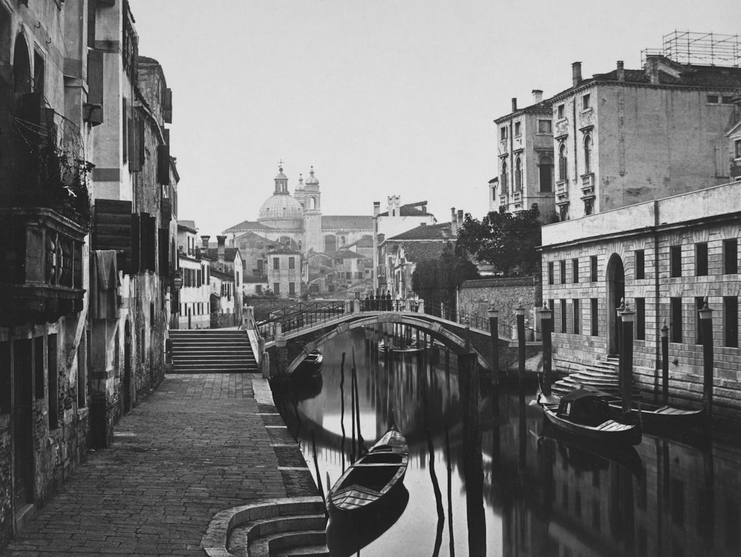 a black and white photo of a canal in a city, View of Venice c. 1860 Carlo Ponti (Italian, 1822–1893) Italy, 19th century Albumen print from wet collodion negative John L. Severance Fund 1988.214 https://www.clevelandart.org/art/1988.214