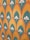 The image features a decorative pattern with repeating geometric shapes resembling pointed arches. Inside each arch is a white stylized floral motif with three leaves. The arches alternate in a layered formation with teal green and mustard yellow as the primary background colors, outlined with a thin brown line.