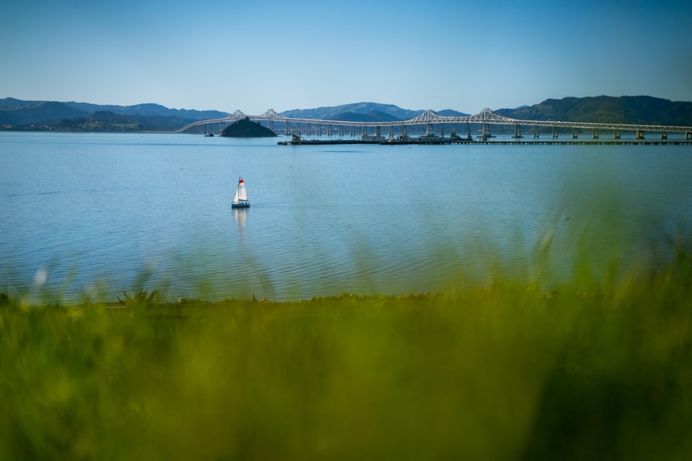 a small boat in a large body of water