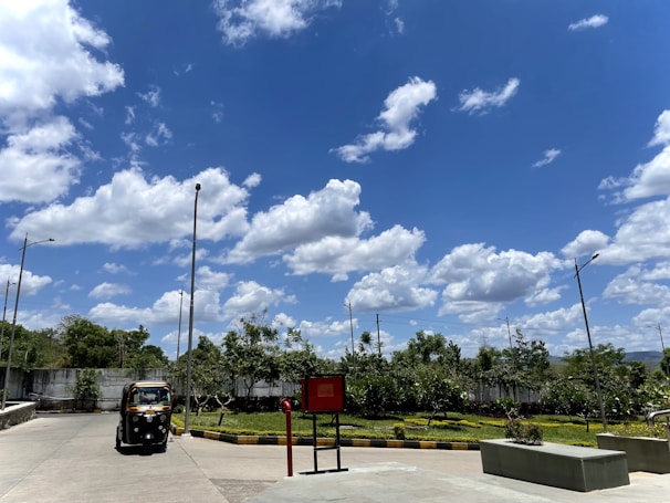 A solar electric tricycle parked in a sunny environment.