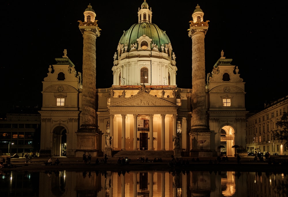 a large building with a dome lit up at night