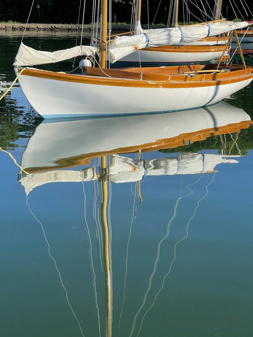 a couple of boats that are sitting in the water