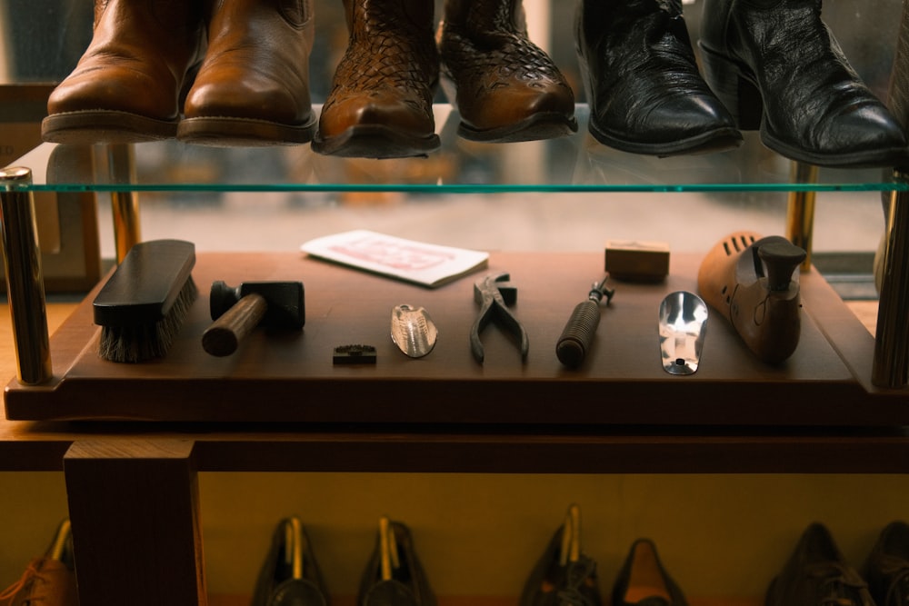 a display case filled with lots of different types of shoes