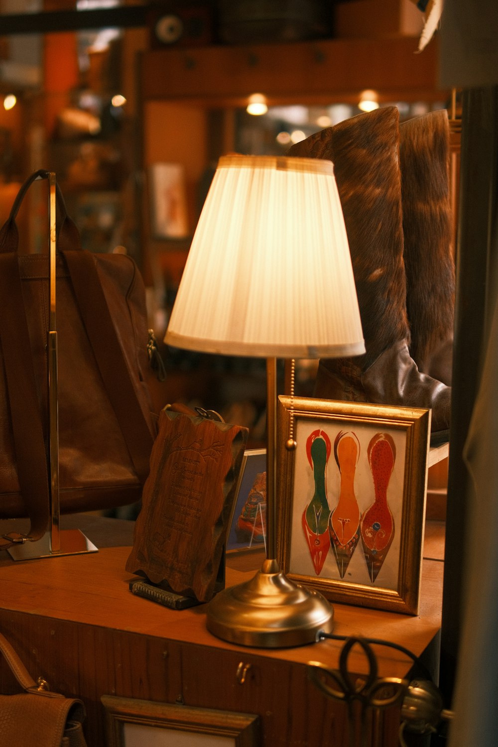 a lamp sitting on top of a wooden table