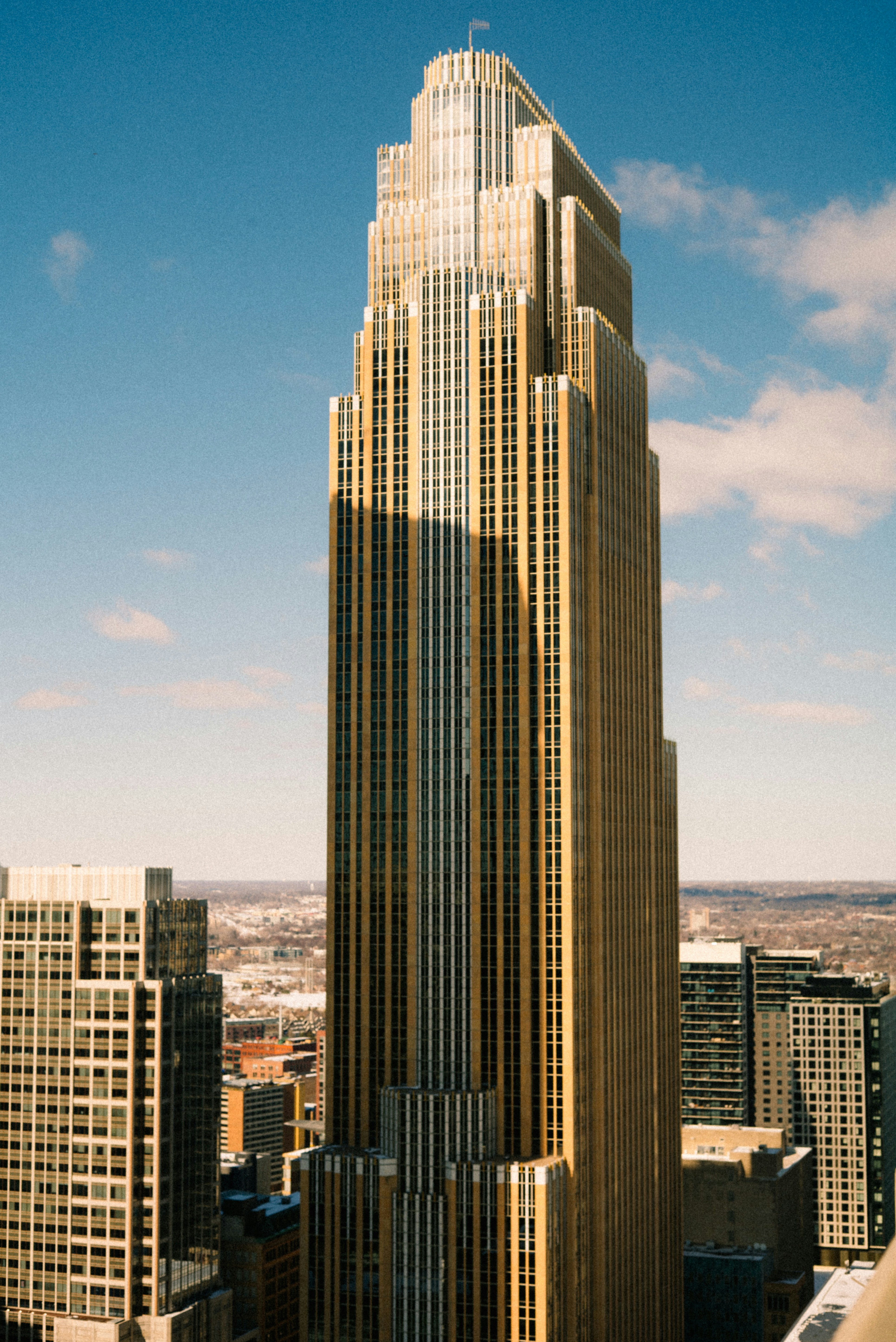 a very tall building in the middle of a city