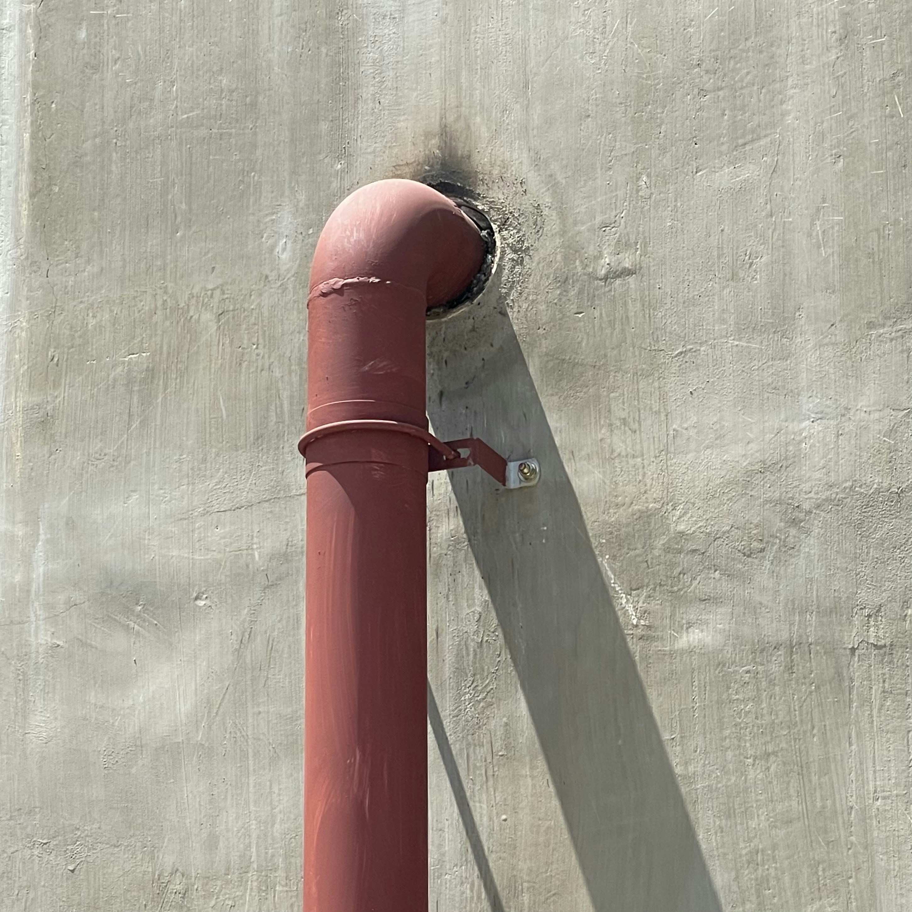 Plumber connecting new water line to residential system