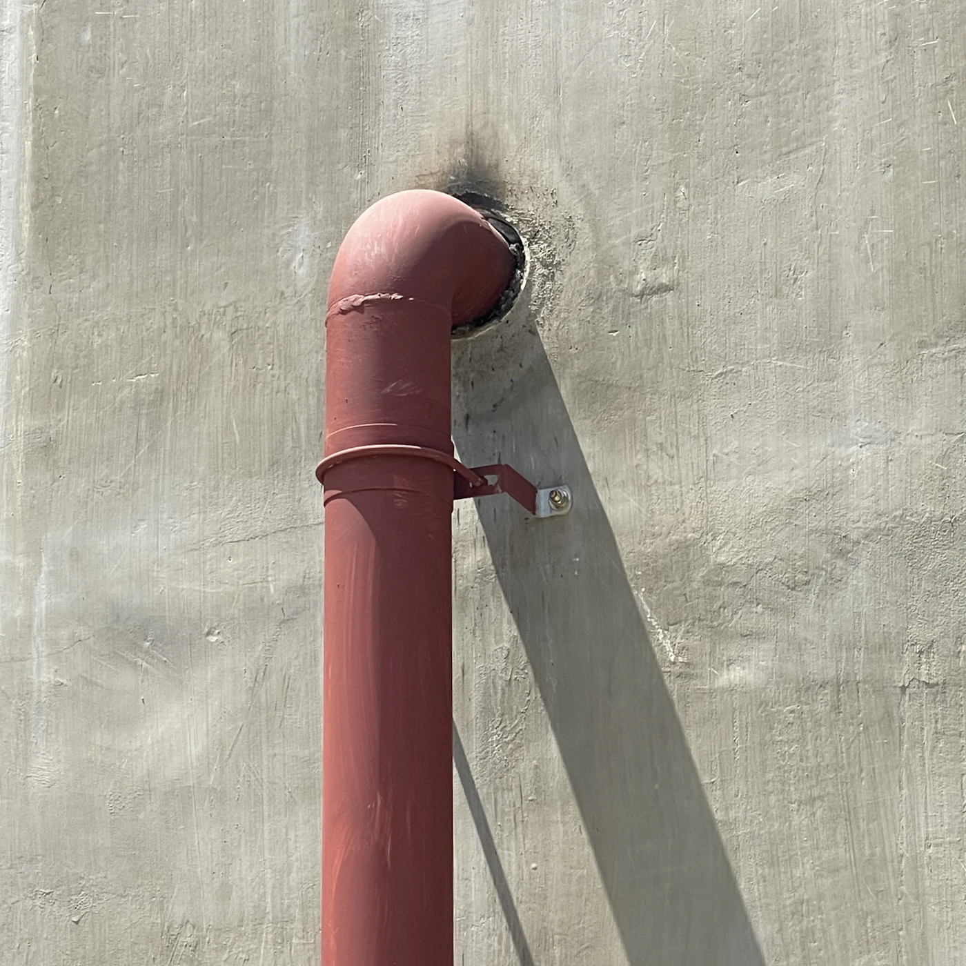 Fixed metal pipe installation representing routed gas piping