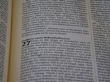 Pages from a book written in English, featuring sections of text with chapter headings and verse numbers. The content appears to be scriptural or religious in nature, discussing historical figures and events.