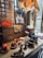 A rustic wooden table adorned with an assortment of colorful homemade snacks, evoking a sense of warmth and nostalgia.
