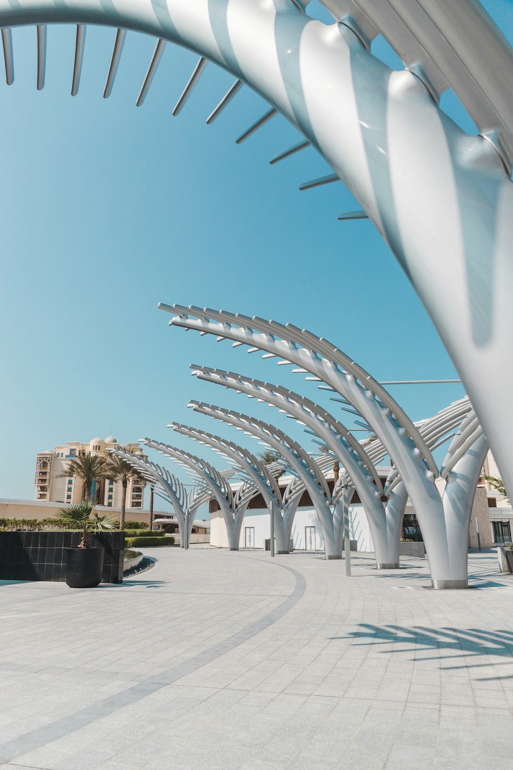 a large white structure with a sky background