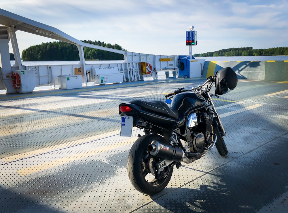 a motorcycle is parked on the side of the road