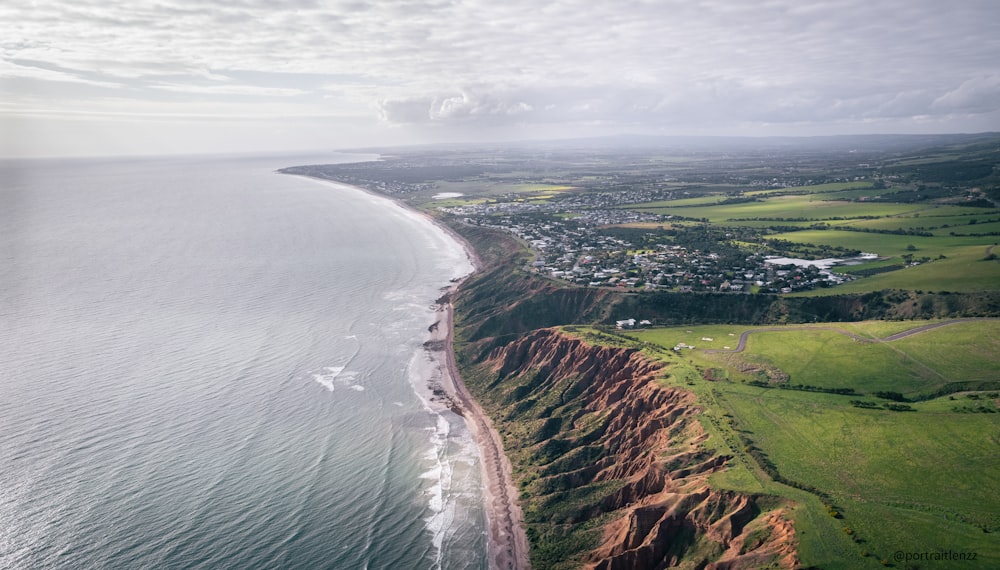 an aerial view of a beach and the ocean