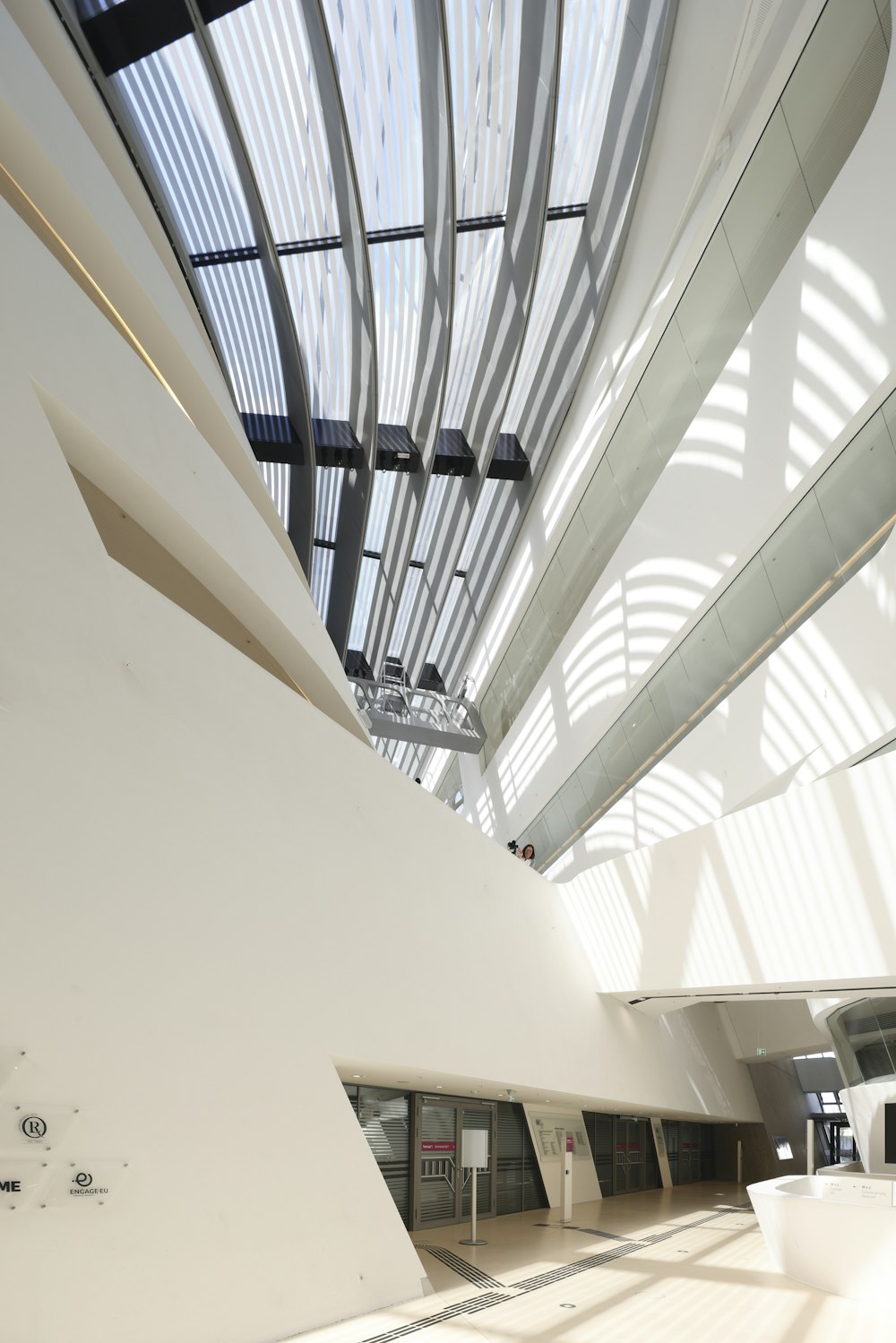 a large white building with a skylight above it