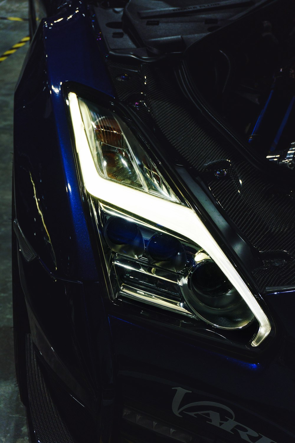 a close up of the headlight of a car