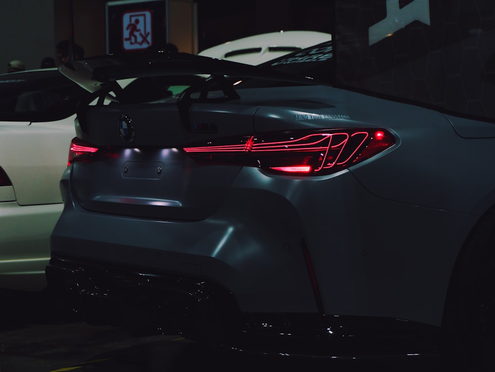 a car parked in a parking lot at night