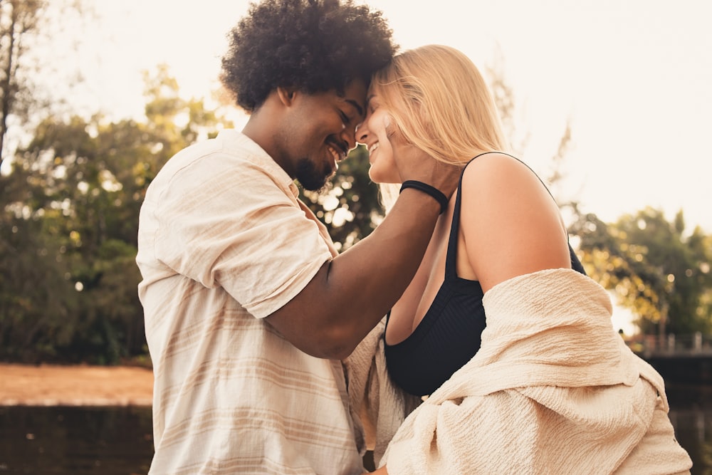 a man and a woman standing next to each other