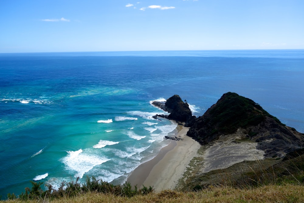 a view of the ocean from a hill