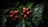 Clusters of ripe coffee cherries attached to a branch with dark green foliage in a low-lit environment.