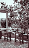 A serene outdoor patio featuring UPVC furniture.