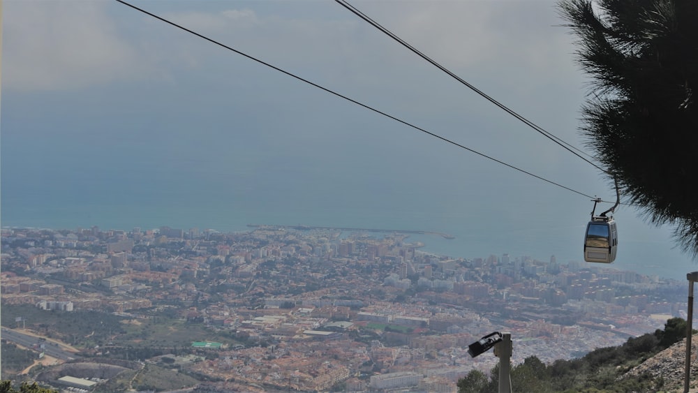 a view of a city from a ski lift