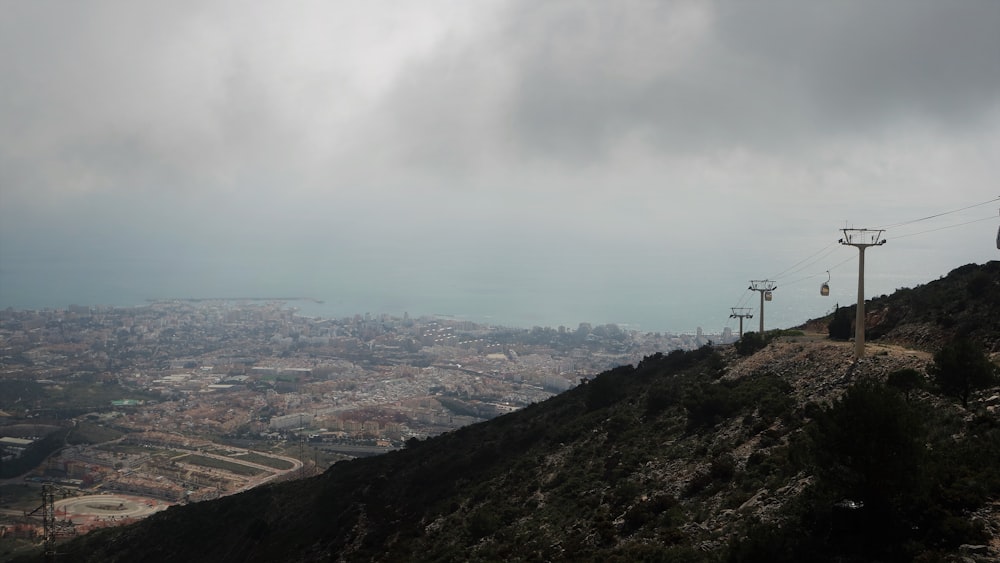 a view of a city from the top of a hill