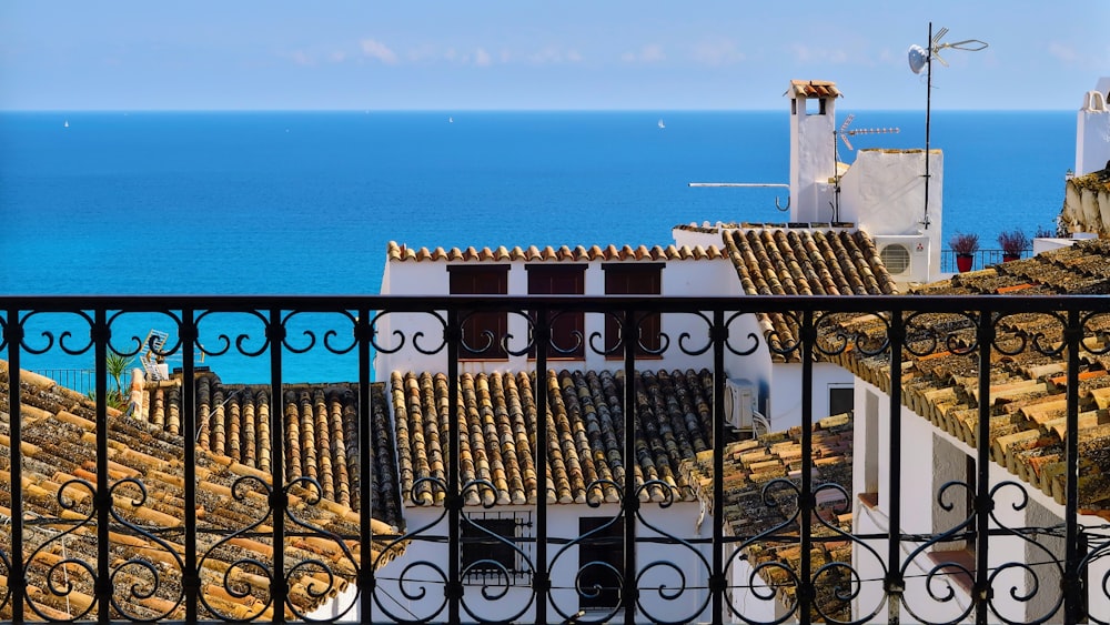 a balcony with a view of the ocean