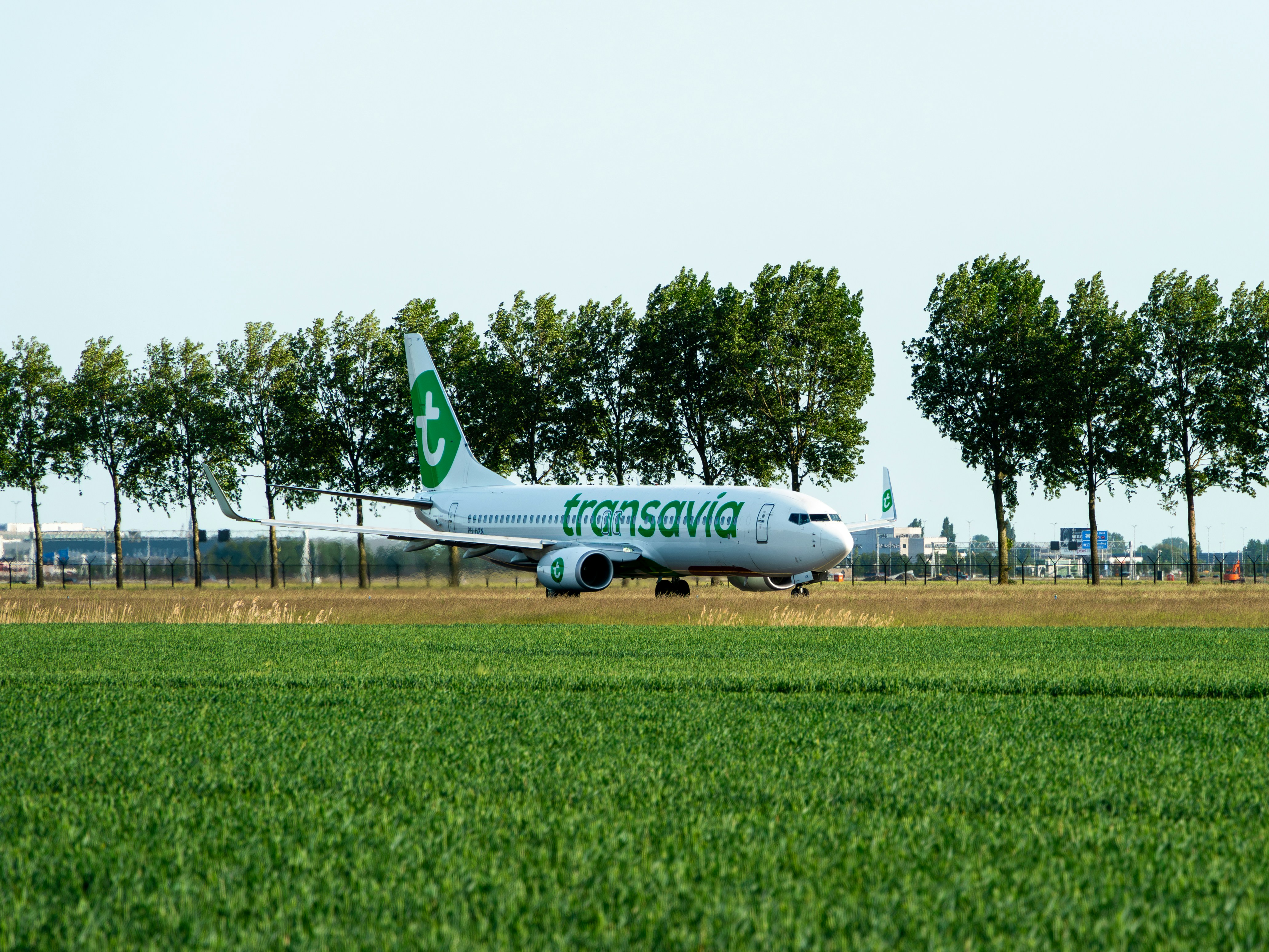 a large passenger jet sitting on top of an airport runway