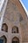 Intricate architectural details featuring elaborate geometric and floral patterns cover the walls and archways. The use of vibrant colors and symmetrical designs highlights traditional tile work and craftsmanship.
