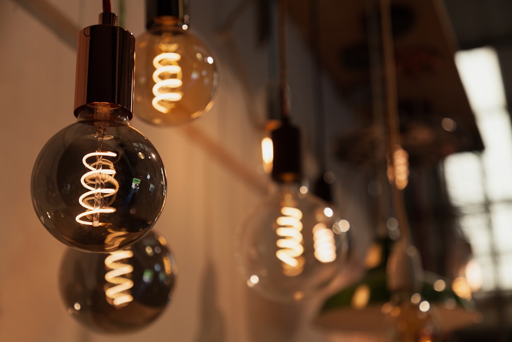 a group of light bulbs hanging from a ceiling