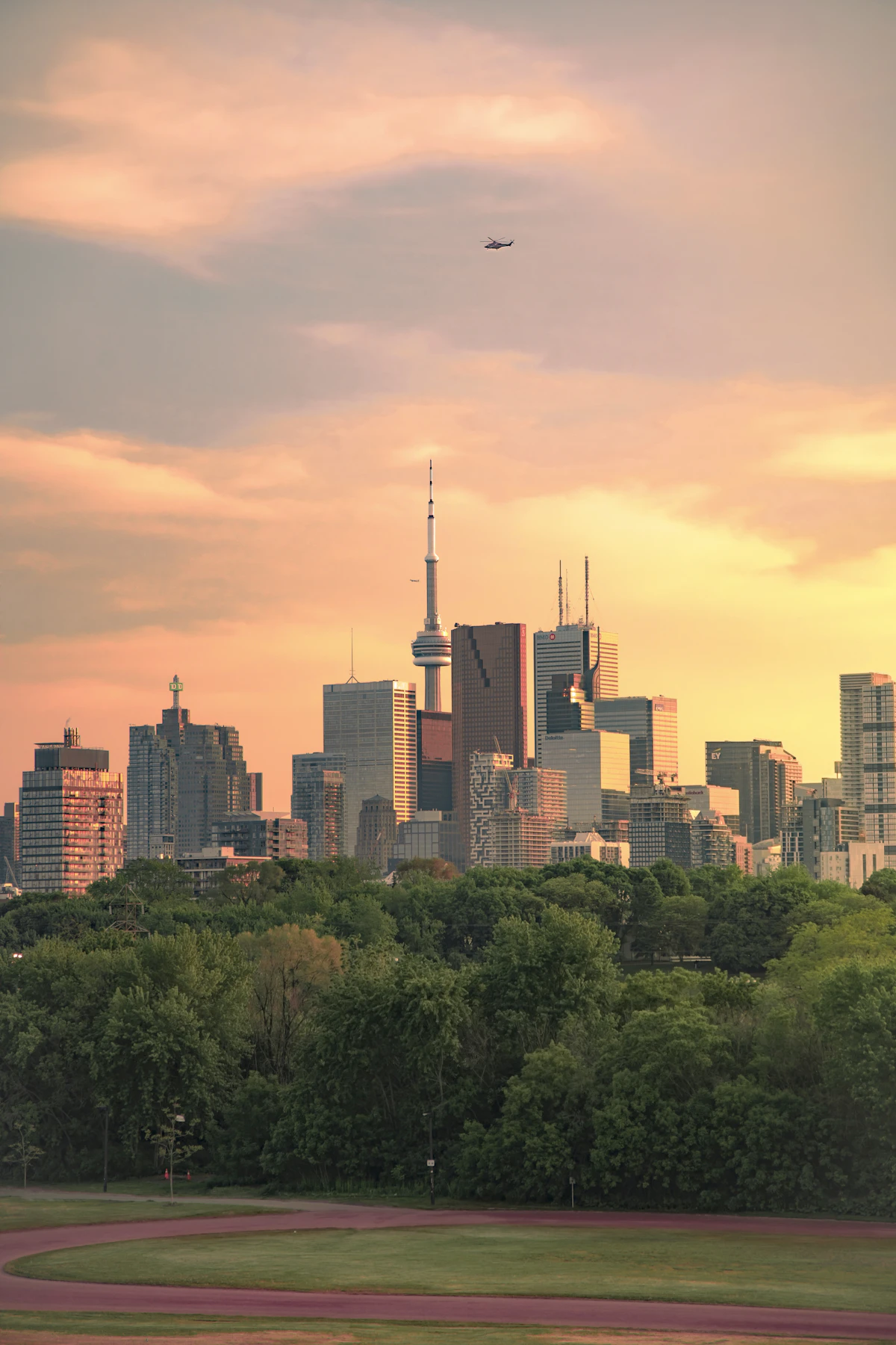 Airliner flying over a Canadian city