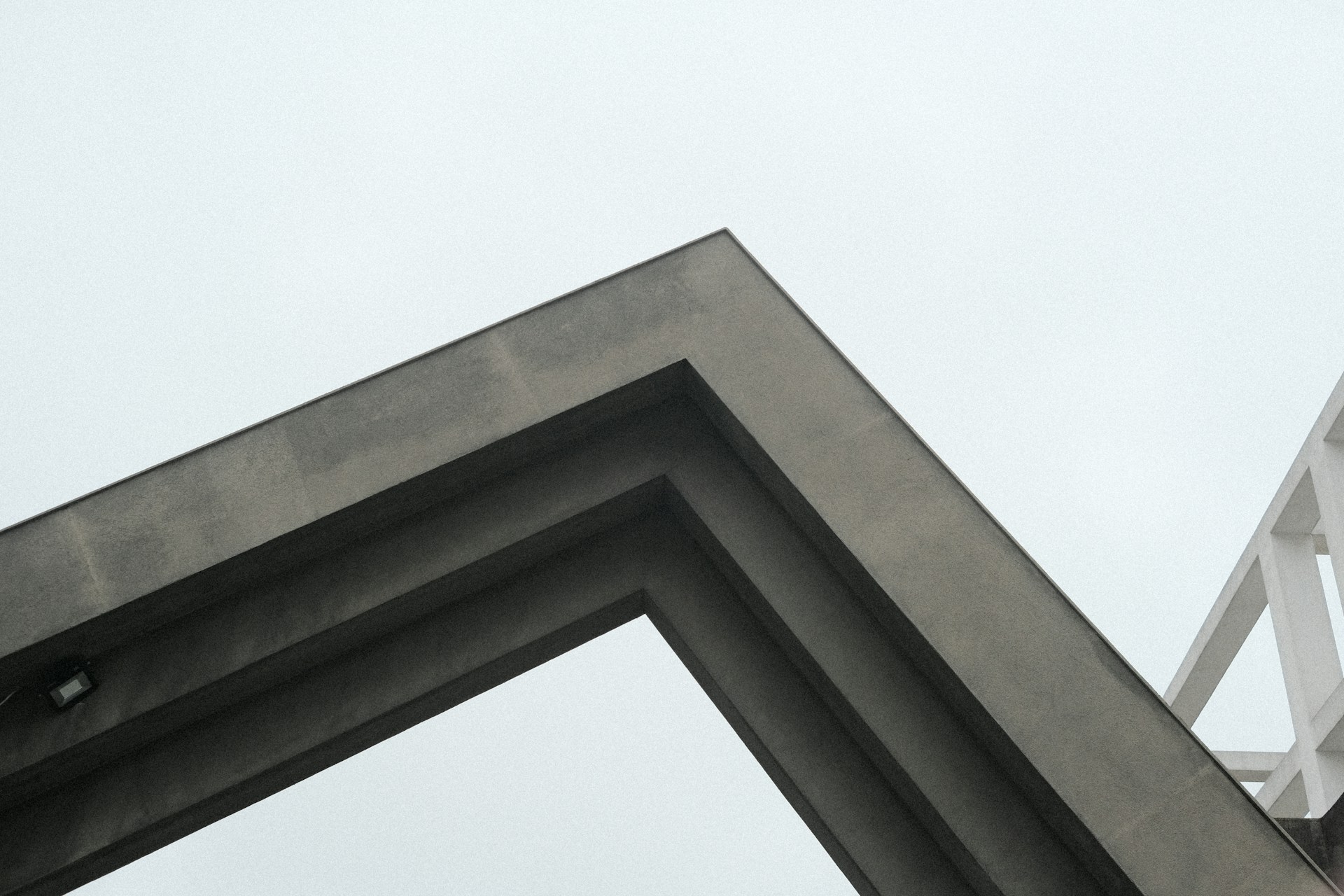 a clock on a tower with a sky background