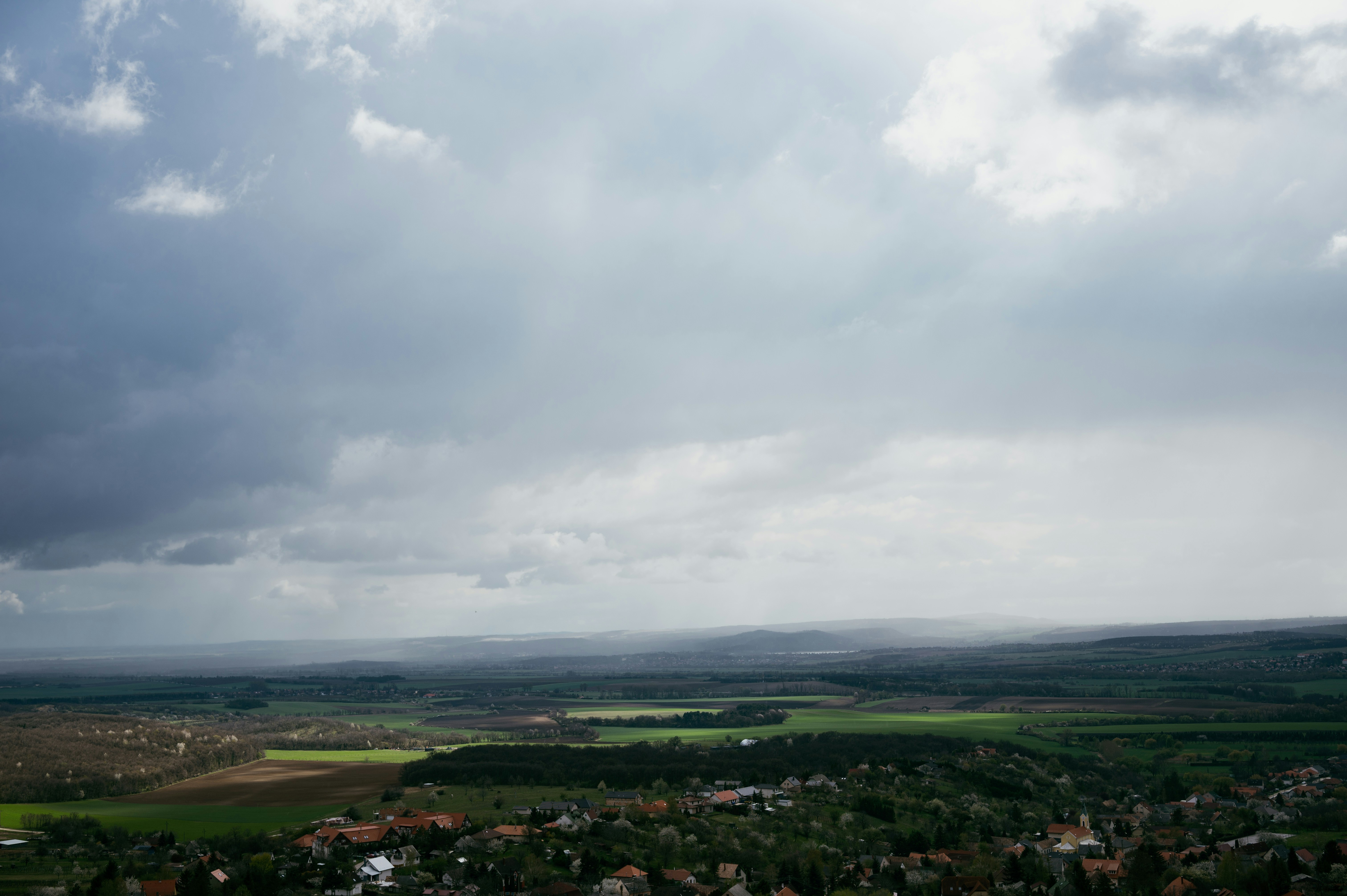 a view of a town from a hill