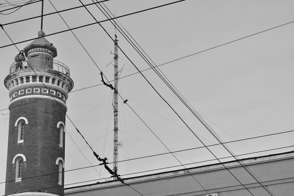 a black and white photo of a tall tower