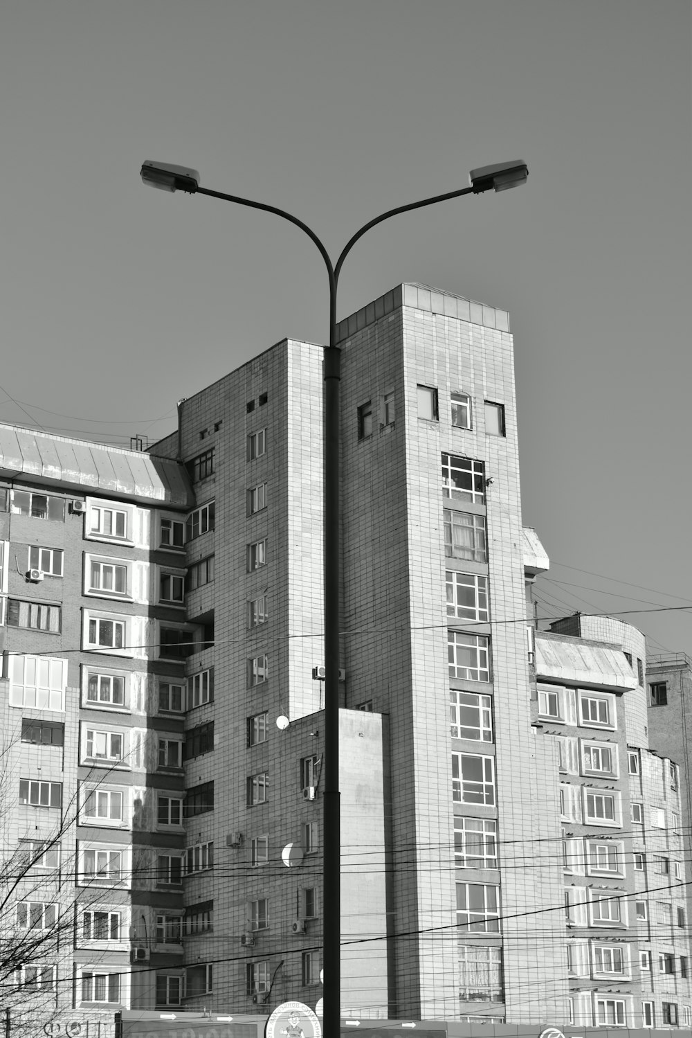 a black and white photo of a tall building